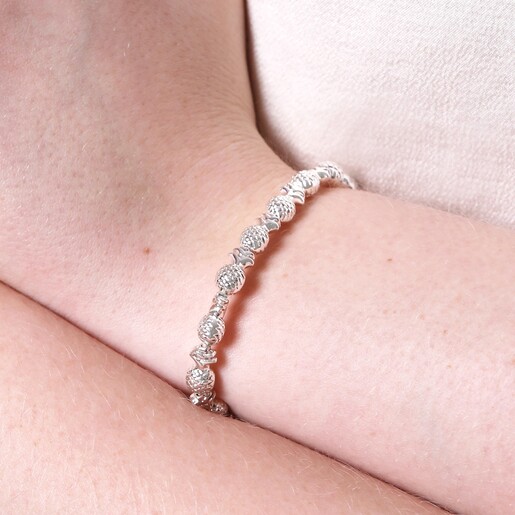Close up of Pineapple Charm Beaded Bracelet in Silver on model