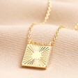 Sunbeam Square Pendant Necklace in Gold on Beige Fabric