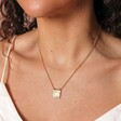 Close Up of Sunbeam Square Pendant Necklace in Gold on Model