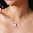 Close up of Sunbeam Square Pendant Necklace in Silver on model
