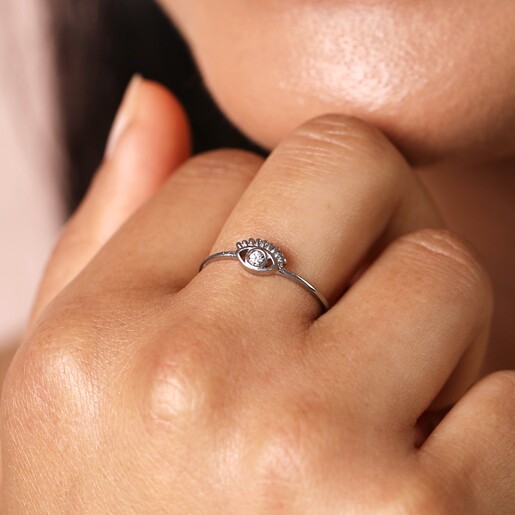 Close up of the Stainless Steel Crystal Eye Ring on a model's middle finger