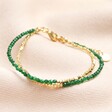 Green Semi-Precious Stone Layered Beaded Bracelet in Gold on Pink Fabric