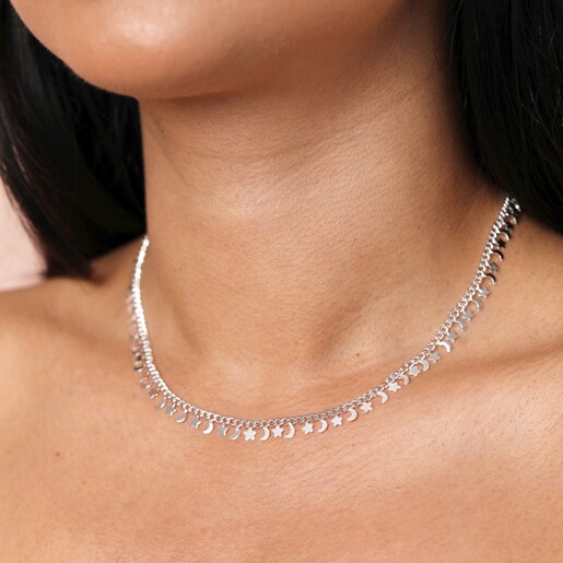 close up of the Dainty Moon and Star Charm Necklace in Silver