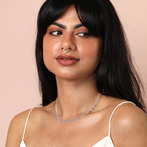 model shot of the Dainty Moon and Star Charm Necklace in Silver