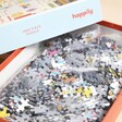 Child of the 90's 1000 Piece Jigsaw Puzzle open showing jigsaw puzzle pieces inside