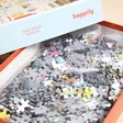 Child of the 90's 1000 Piece Jigsaw Puzzle open showing jigsaw puzzle pieces inside