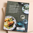 Back of Foolproof Air Fryer Recipe Book against beige coloured backdrop
