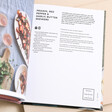 Foolproof Air Fryer Recipe Book open on recipe inside of air fryer