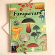 Fungarium: Welcome to the Museum Book on Beige Surface