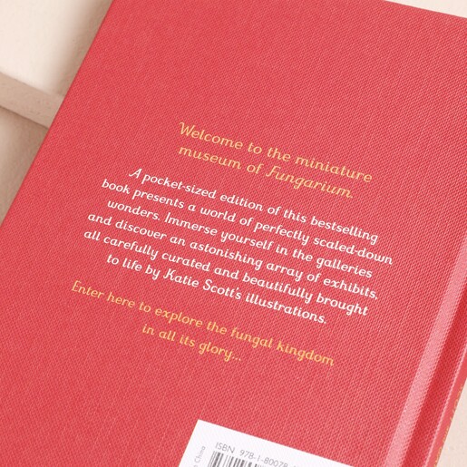 Back Cover of Fungarium: A Mycologist's Guide to Mushrooms Book The Back Cover of Fungarium: A Mycologist's Guide to Mushrooms on Beige Background
