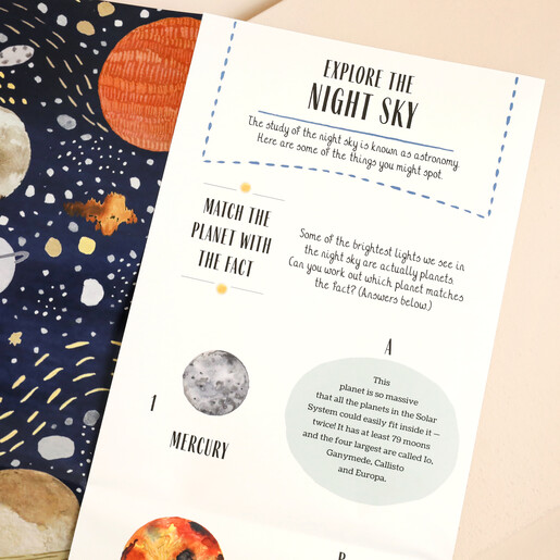 Inside page of Glow 500 Piece Jigsaw Puzzle against beige backdrop