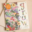 Grow: A First Guide to Plants Book on Beige Surface