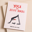 Yoga for Stiff Birds Book against beige coloured backdrop