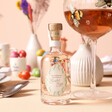 100ml Better Than An Easter Egg Citrus Gin on Beige Surface with Easter Table Decorations
