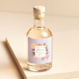200ml I Was Going To Buy You Flowers Pink Gin against neutral coloured backdrop