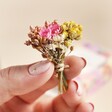 Model holding posy out of You're So Wonderful Tiny Matchbox Dried Flower Posy
