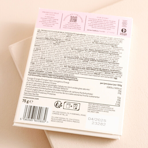 Back of Love Cocoa Prosecco 41% Milk Chocolate Bar against beige background showing ingredients and nutritional information