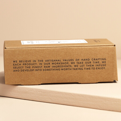 Side of packaging showing information on Norfolk Natural Living Set of 3 Mini Candles