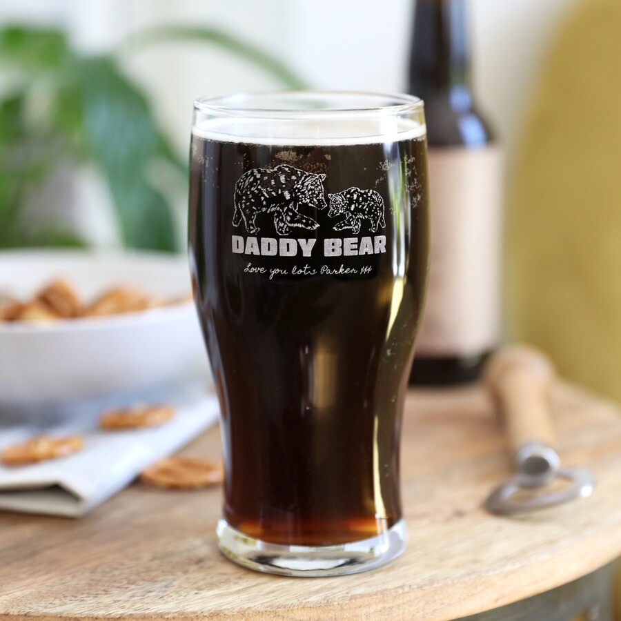 Personalised 'Daddy Bear' Engraved Pint Glass against beige coloured backdrop