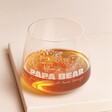 Personalised 'Daddy Bear' Whiskey Glass with whisky against beige background