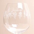 Close up of personalisation on Personalised Engraved Wildflower Balloon Gin Glass