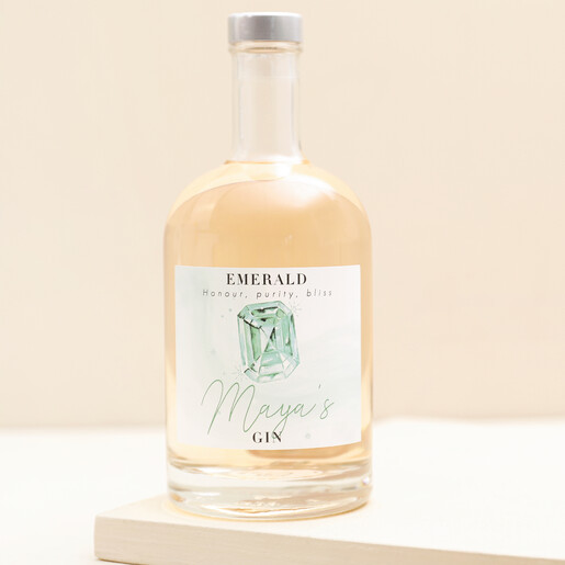 Personalised 500ml Birthstone Gin Personalised 500ml Birthstone Gin with pink gin inside against beige backdrop