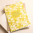 Ohh Deer Yellow Flower Beautiful Birthday Card  on top of envelope on beige surface 