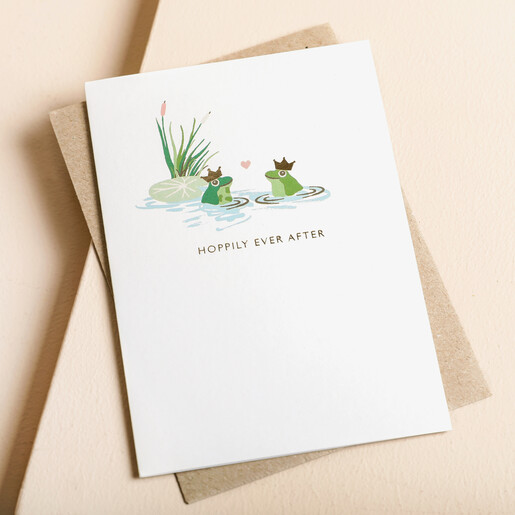 Cath Kidston Hoppily Ever After Greetings Card on top of Envelope on Beige Surface 