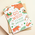 Ohh Deer Go Wild Jungle Birthday Card on top of envelope on beige surface