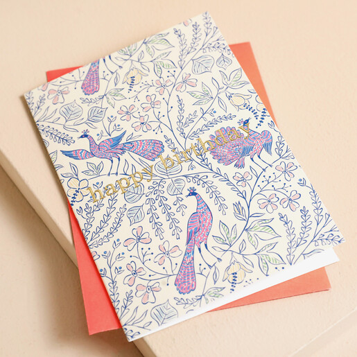 Ohh Deer Peacock Birthday Card on top of orange envelope