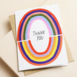 Ohh Deer Rainbow Thank You Greetings Card on Top of Envelope on Beige Surface 