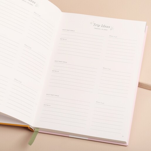 Papier Follow The Sun Travel Journal open showing inside page against beige coloured backdrop