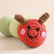 Pebble Friendly Caterpillar Rattle Smiley Face