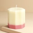 The Recycled Candle Company Pink Jasmine and Pear Octagon Candle against beige coloured background
