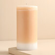 The Recycled Candle Company Blonde Amber and Honey Pillar Candle against beige coloured background