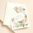 Rifle Paper Co. Garden Party Mother's Day Card with White Envelope on Beige Surface