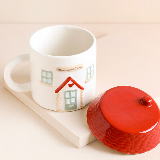 Sass & Belle House Shaped Mug and Lid on a Neutral Background