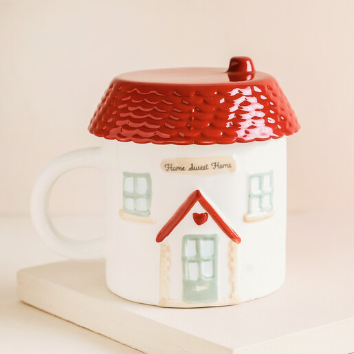 Sass & Belle House Shaped Mug on a Neutral Background