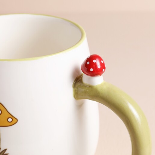 Close Up Close up of raised ceramic mushroom on Sass & Belle Retro Keep Growing Mug