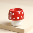 Sass & Belle Toadstool Egg Cup on Raised Surface 
