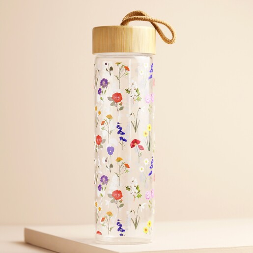 Wildflower Glass and Bamboo Water Bottle on Pink Background