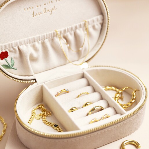 Personalised Embroidered Flowers Oval Velvet Jewellery Case open with jewellery inside against neutral background