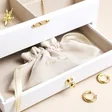 Open Draw with Jewellery Bag on Beige Background