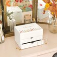 Personalised Wildflower White Jewellery Box in lifestyle shot on dresser in front of mirror