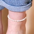 Close Up of Freshwater Pearl Anklet in Gold on Model