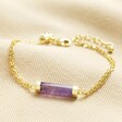 Amethyst Charm Chain Bracelet in Gold on Beige Fabric