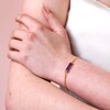 Model Wearing Amethyst Charm Chain Bracelet in Gold