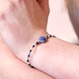 Close Up of Blue Crystal and Stone Beaded Bracelet on Model
