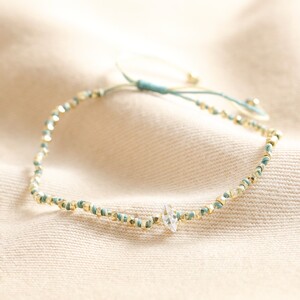 Crystal Blue and White Beaded Cord Bracelet in Gold