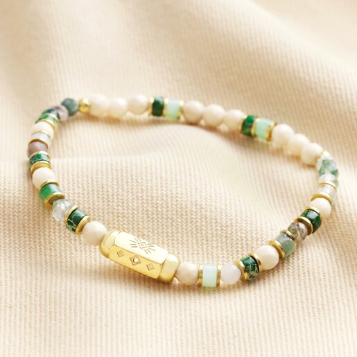 Gold Stainless Steel Green Semi-Precious Stone Beaded Bracelet on Beige Fabric 